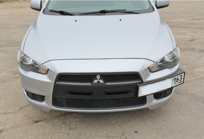 Рамка под номер на передний бампер для Mitsubishi Lancer X (2007-2016) купить недорого с доставкой в Тихвин
